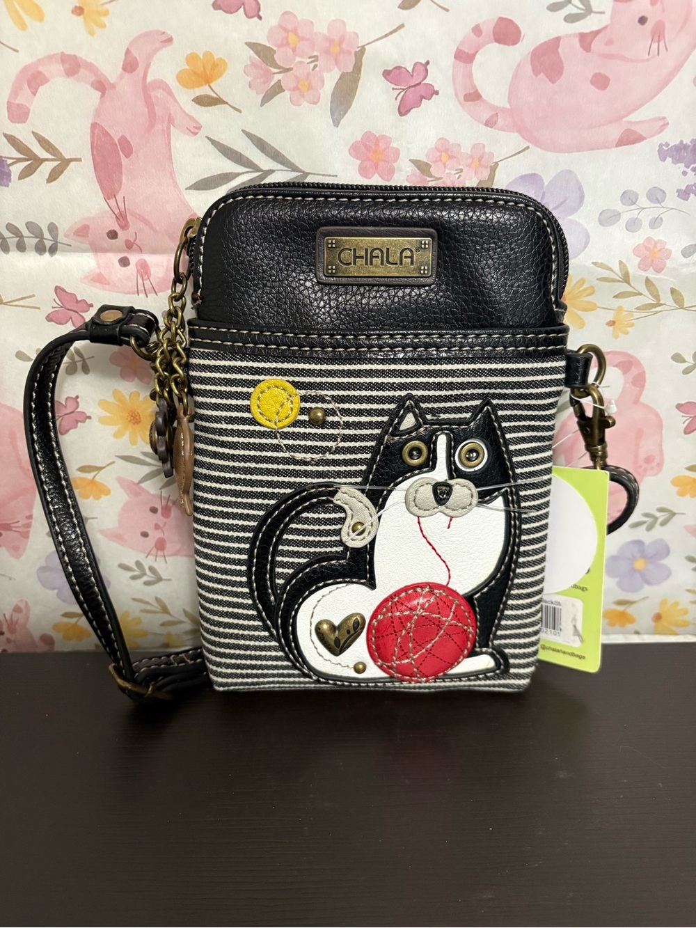 Chala Black & White striped cat with red ball cell phone crossbody purse. NWT